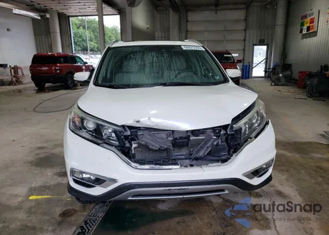 2016 Honda Cr-V Touring z USA, uszkodzony, nr VIN 5J6RM4H94GL106444